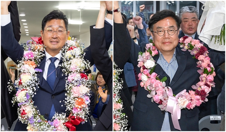 제22대 국회의원선거에 울산 동구에서 당선된 더불어민주당 김태선 당선인(왼쪽)과 울주에서 당선된 서범수 당선인이 11일 오전  당선이 확정된 후 지지자들과 함께 승리를 자축하고 있다.
